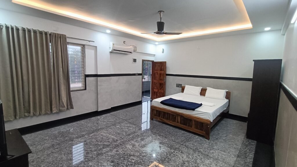 The expansive double bedroom at Vanjala Residency.